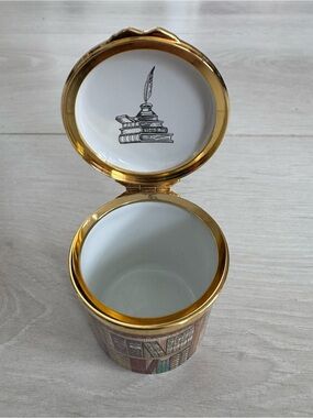 Enamel trinket box with bookshelf design by Halcyon Days